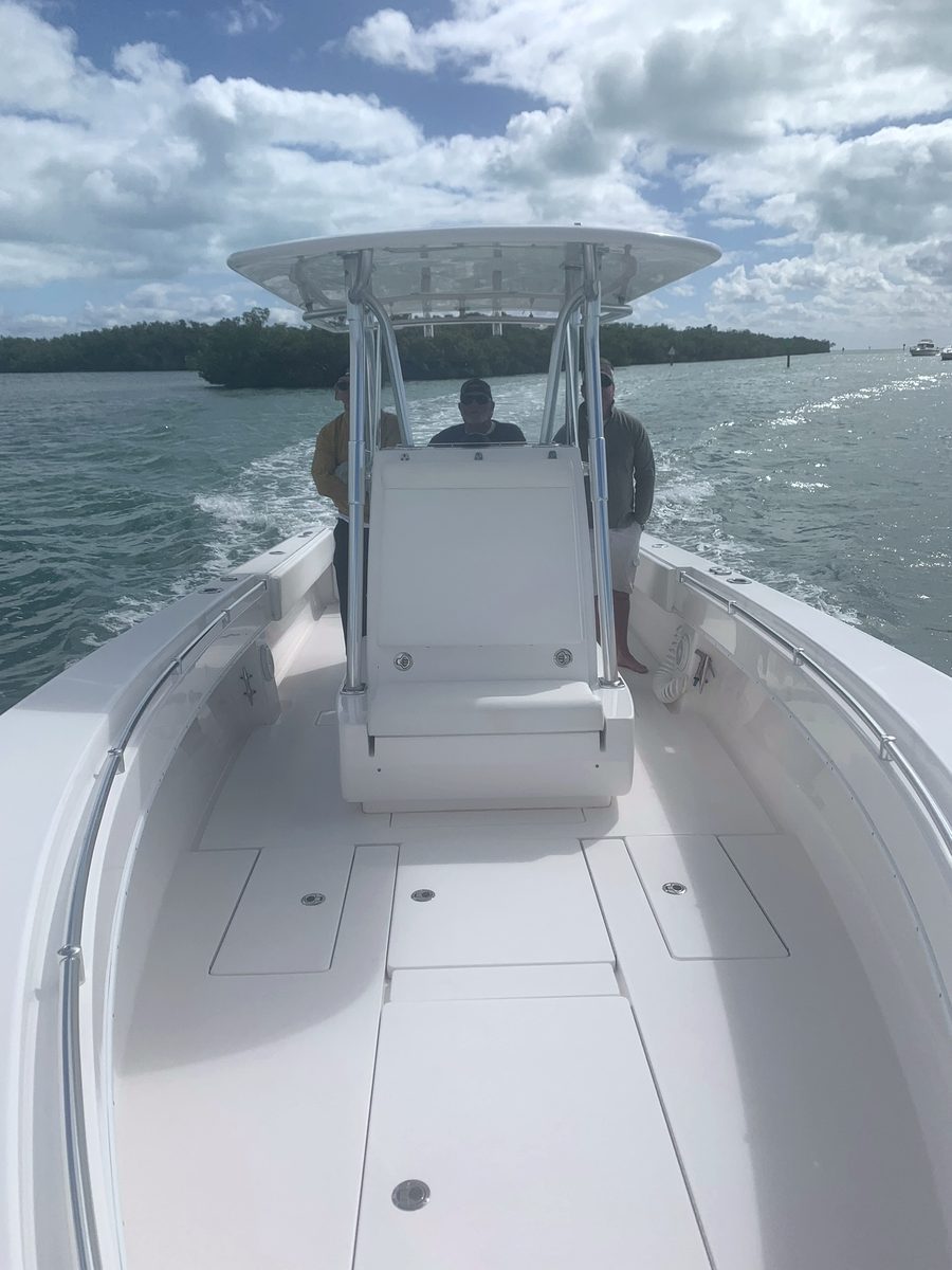 Blue Cowboy – bow and console area under way with anglers at the helm, Key West FL
