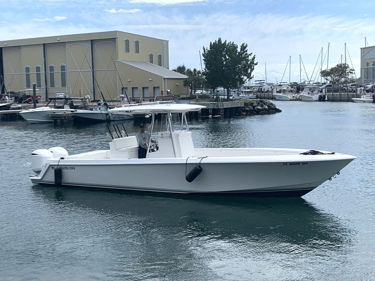 Blue Cowboy – starboard profile view under way in the harbor, Key West FL