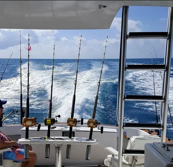 The Cowboy – view from inside the cabin looking out at the wake through the fighting chairs and rod holders, Key West FL