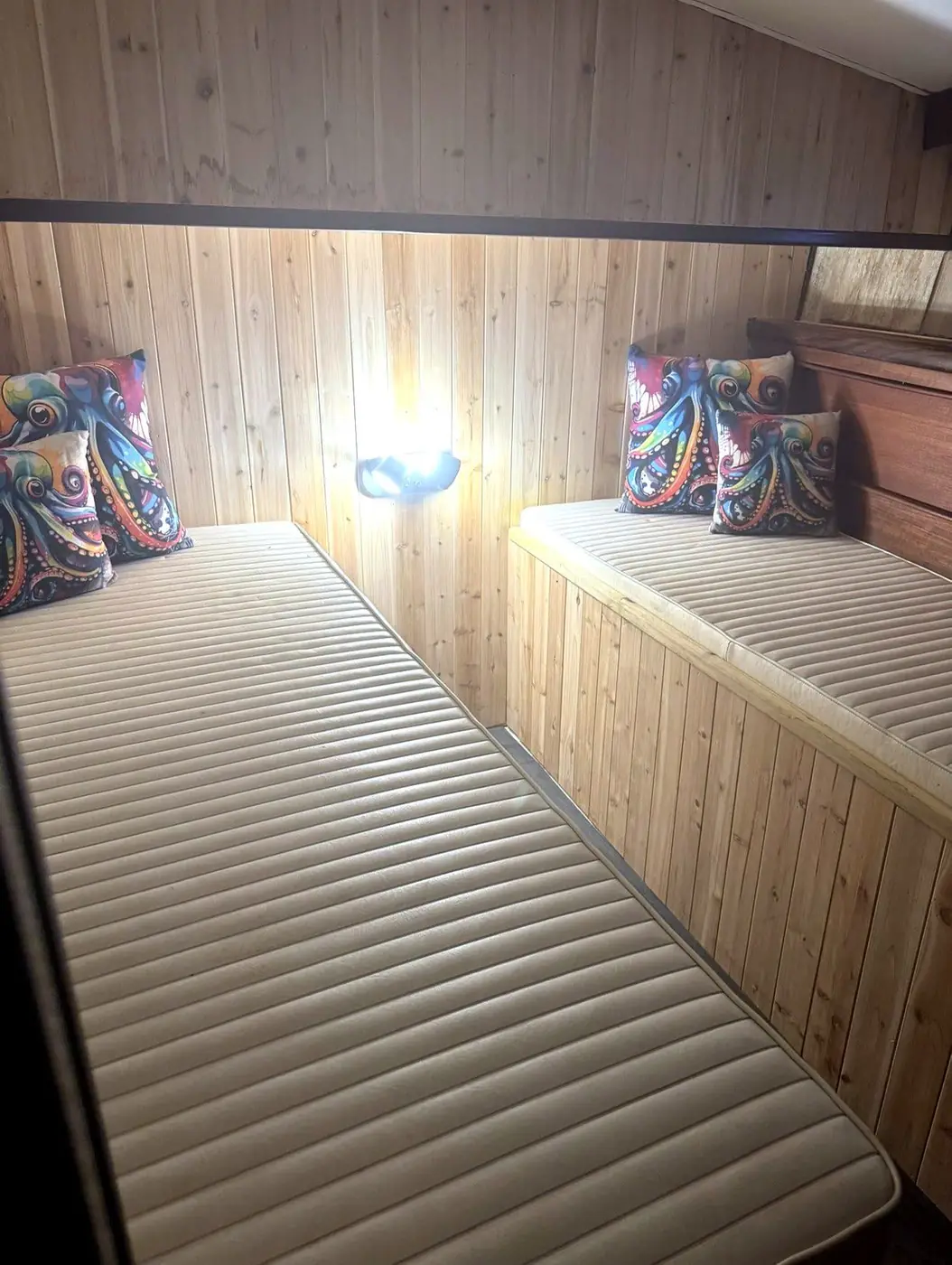 The Sanctuary – cabin berths with cushioned bunks for resting on long offshore runs