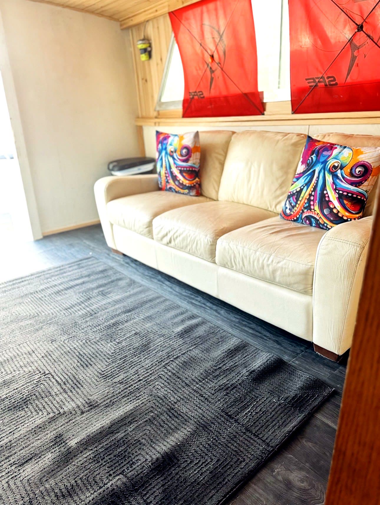 The Sanctuary – wide view of the salon seating and cabin flooring