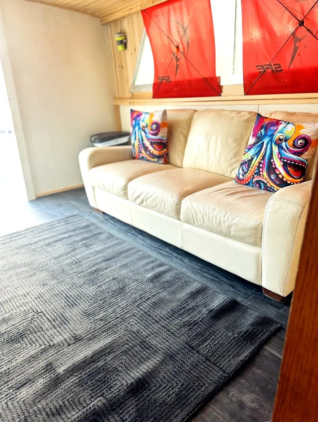 The Sanctuary – wide view of the salon seating and cabin flooring