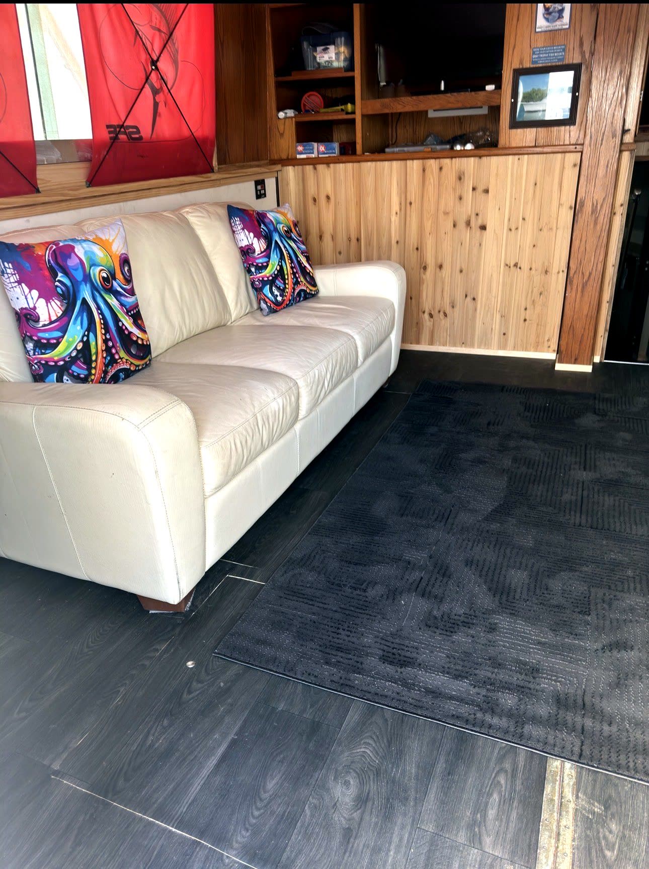 The Sanctuary – air-conditioned salon with leather couch, Key West charter boat