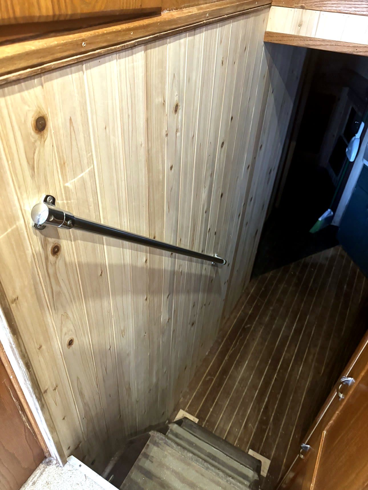 The Sanctuary – interior stairwell leading below deck with handrail