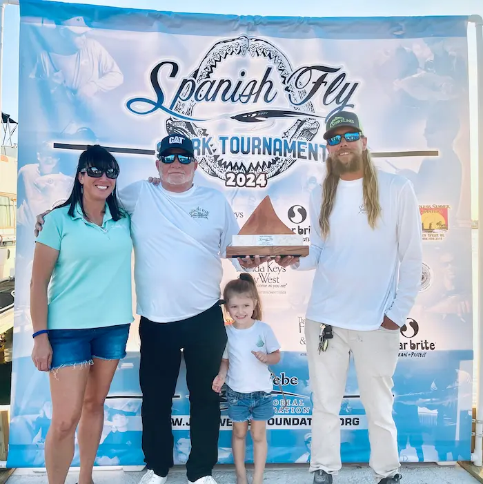 Cowboy Cowgirl Sportfishing team accepting 2nd place trophy at the 2024 Spanish Fly Shark Tournament