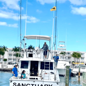 a boat is docked next to a body of water