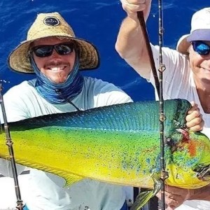 a person holding a fish