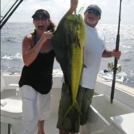 a person holding a fish