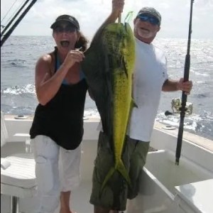 a person holding a fish