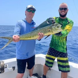 a man holding a fish