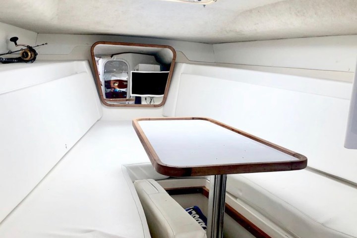 a bedroom with a bed and a desk