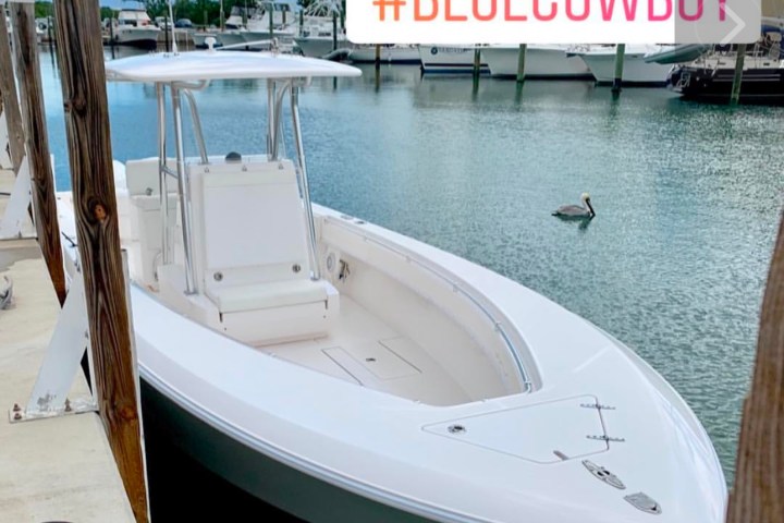 a small boat in a body of water